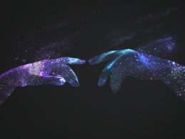 two digital hands touching, representing web3